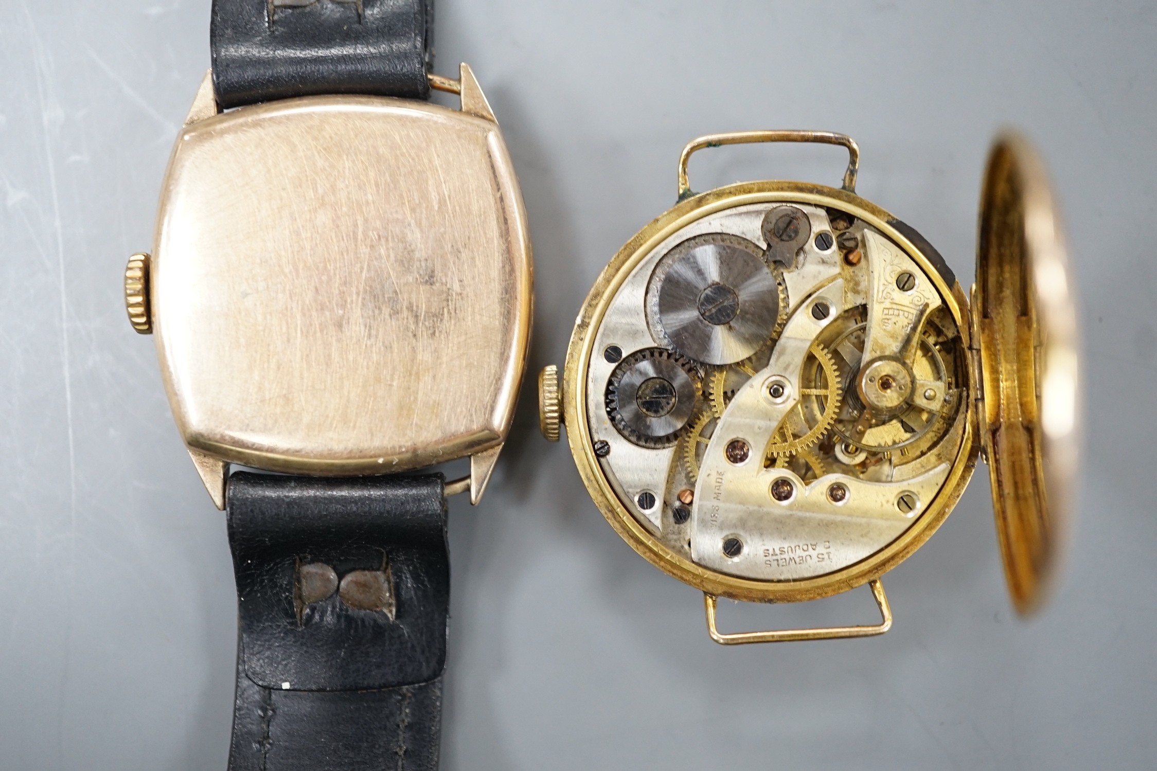 A gentleman's 1930's 9ct gold manual wind wrist watch (no strap), with case back inscription and one other gentleman's yellow metal manual wind wrist watch.